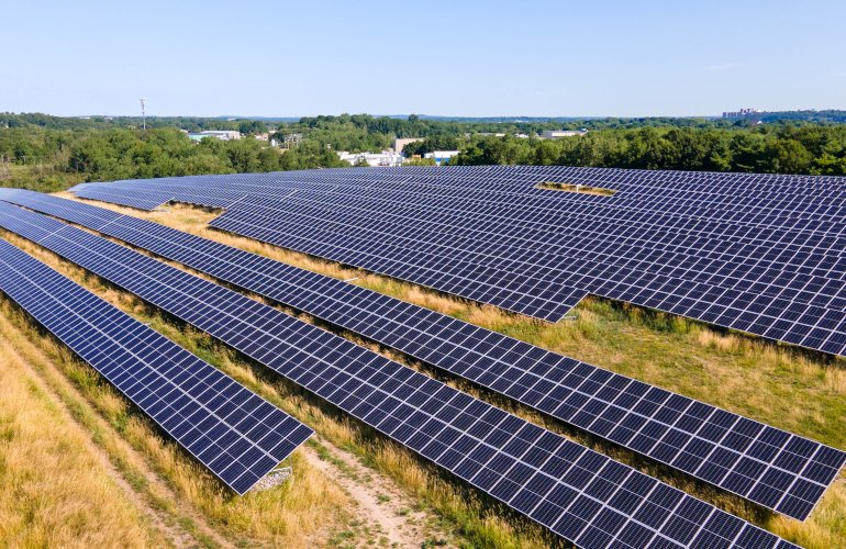 revision-to-build-1.34-mw-community-solar-array-atop-former-landfill